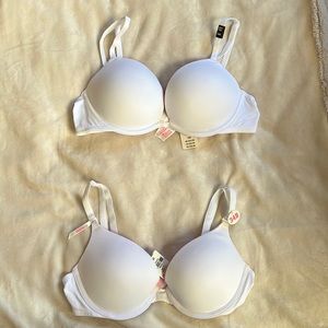 Two 34B pink Victoria’s Secret bras
